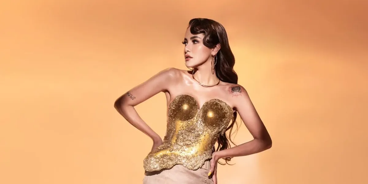 Portrait of Olla Ramlan in the Latest Photoshoot, Showcasing Body Goals in a Golden Dress