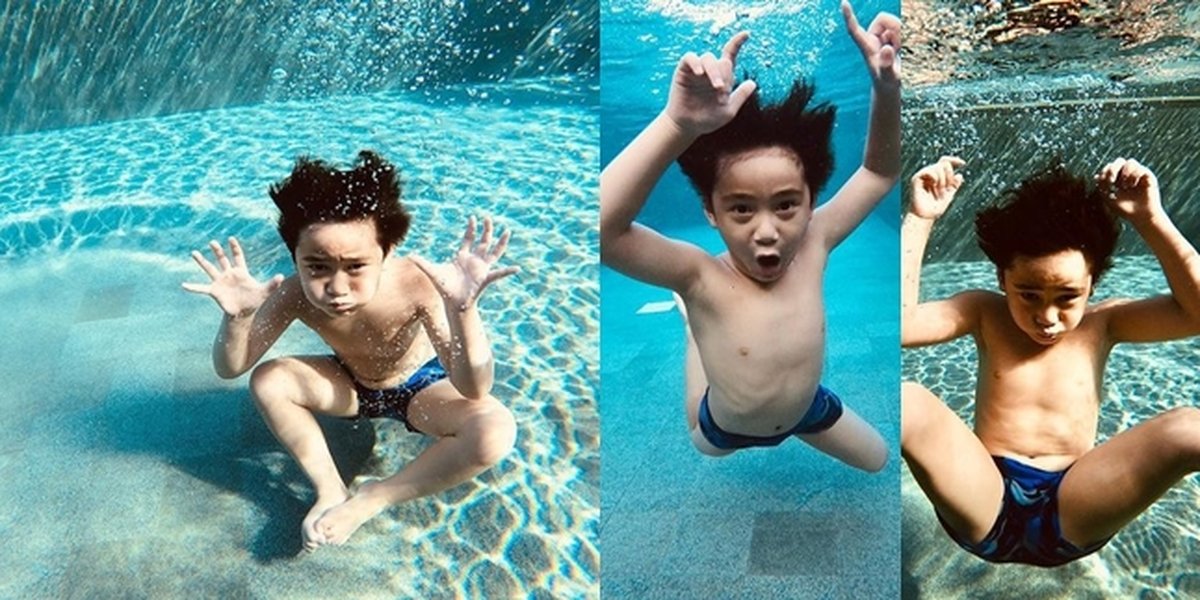 Portrait of Rafathar Diving and Posing with an Underwater Camera, His Funny Behavior