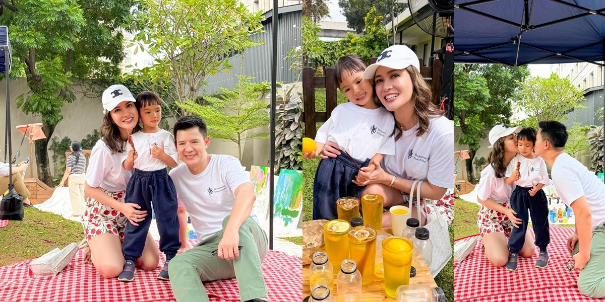 Portrait of Shandy Aulia in agreement with David Herbowo, both accompanying children on a picnic at school