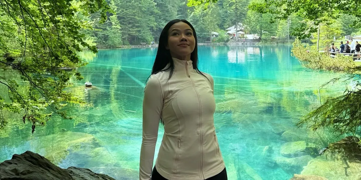 Portrait of Yura Yunita & Husband Vacationing at Lake Blausse Switzerland, Very Happy