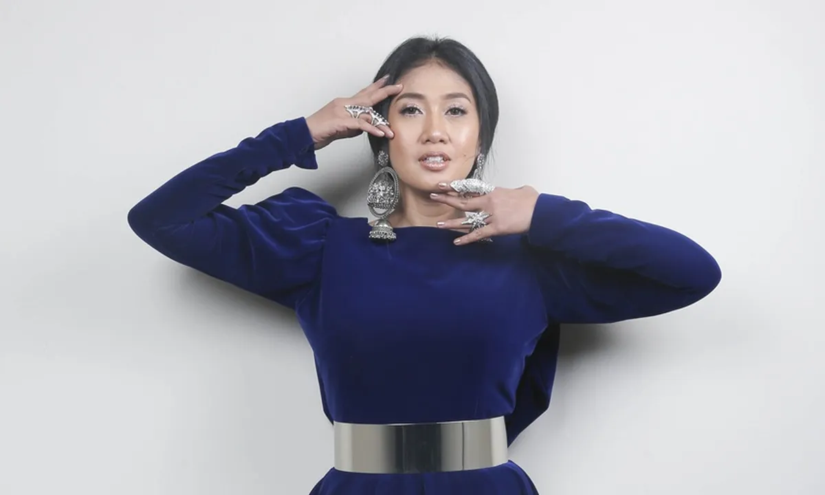 Awali Karier Sebagai Penyanyi Rock, Cerita Perjalanan Pedangdut Erie Suzan
