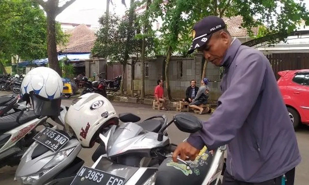 Pernah Juara Tinju Dunia, Dobrak Arter Sekarang Jadi Juru Parkir