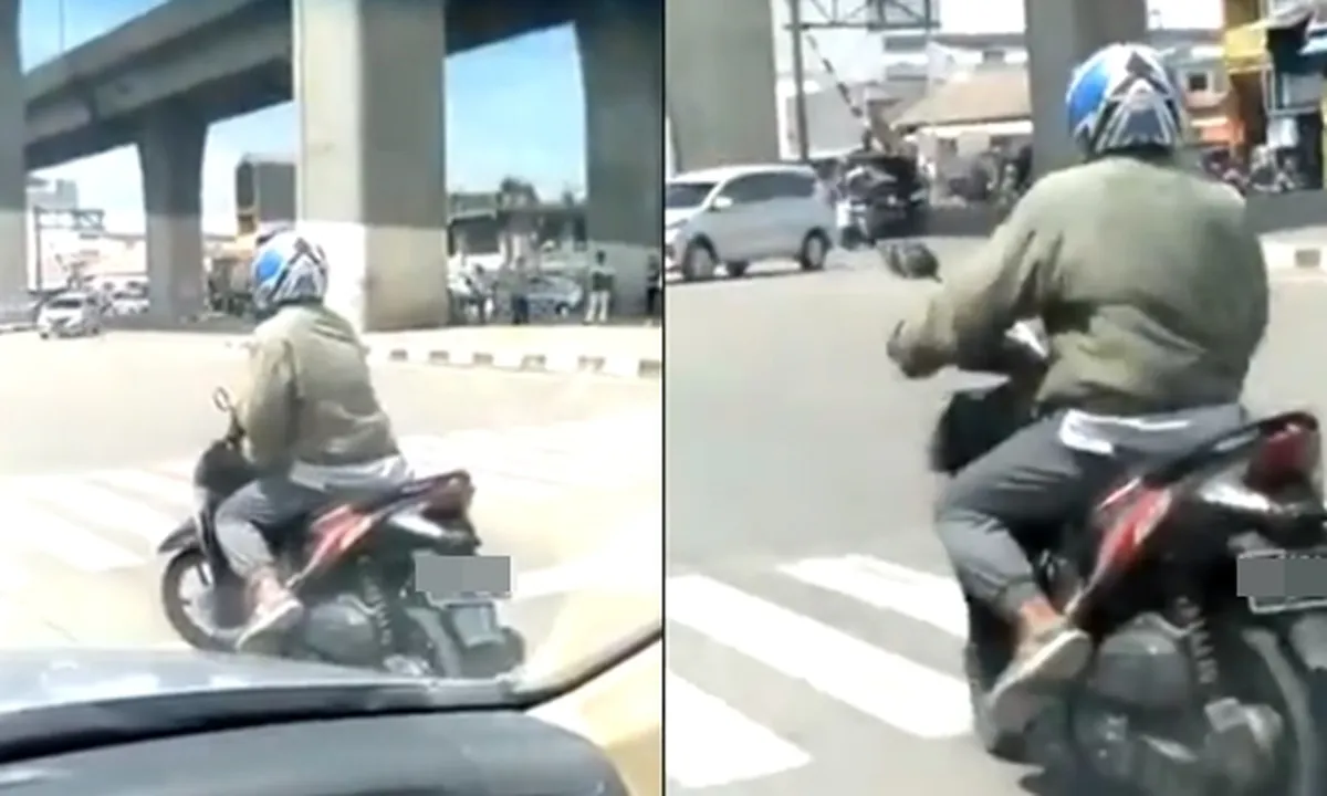 Skill Tingkat Dewa, Pria Ini Tak Mau Turunkan Kaki Dari Motor Saat Lampu Merah