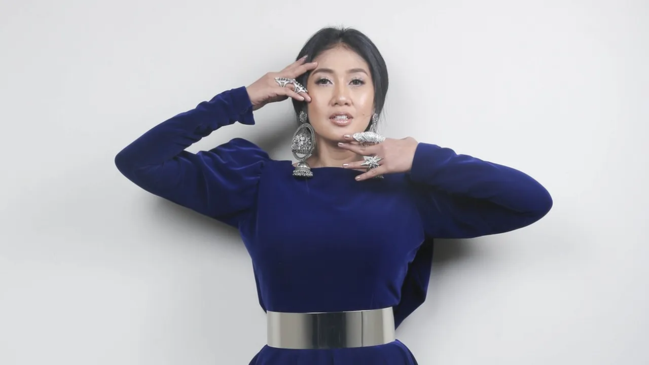 Awali Karier Sebagai Penyanyi Rock, Cerita Perjalanan Pedangdut Erie Suzan