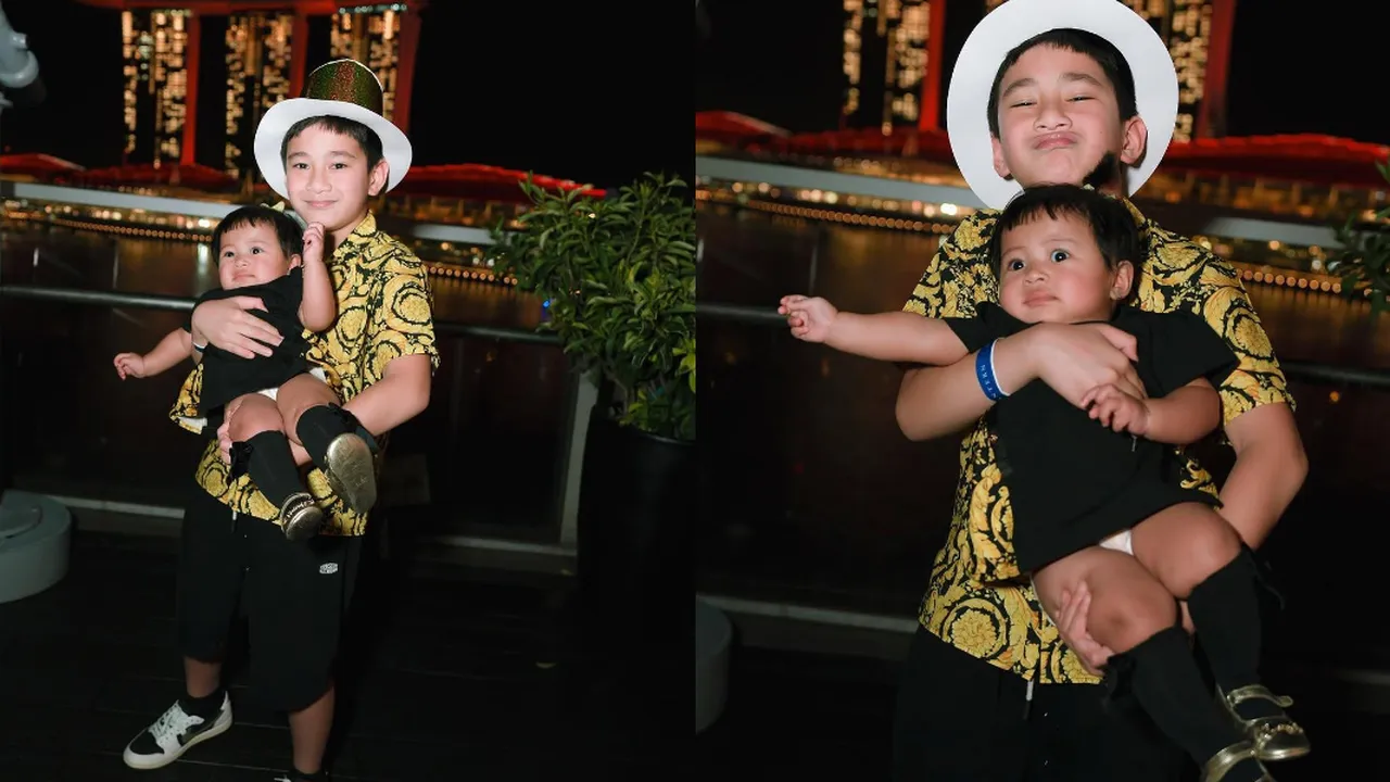 Potret Gemas Rafathar Gendong Lily, Ekspresinya Bikin Netizen Tersentuh