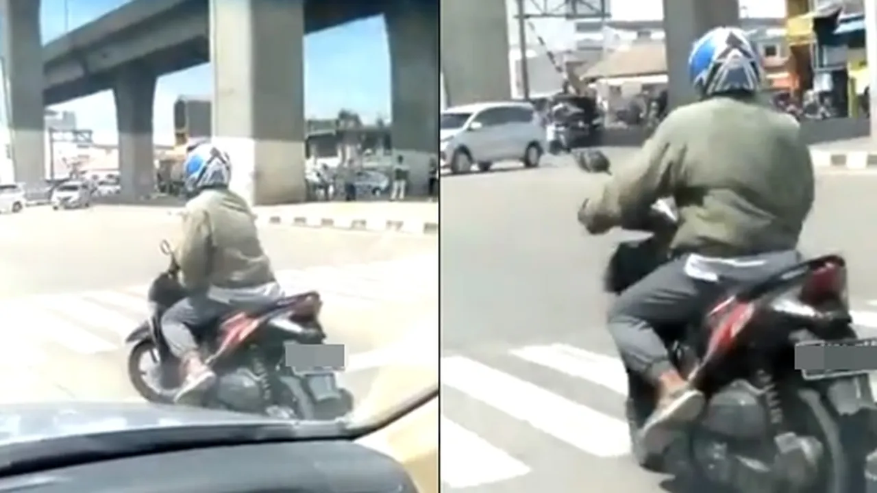 Skill Tingkat Dewa, Pria Ini Tak Mau Turunkan Kaki Dari Motor Saat Lampu Merah