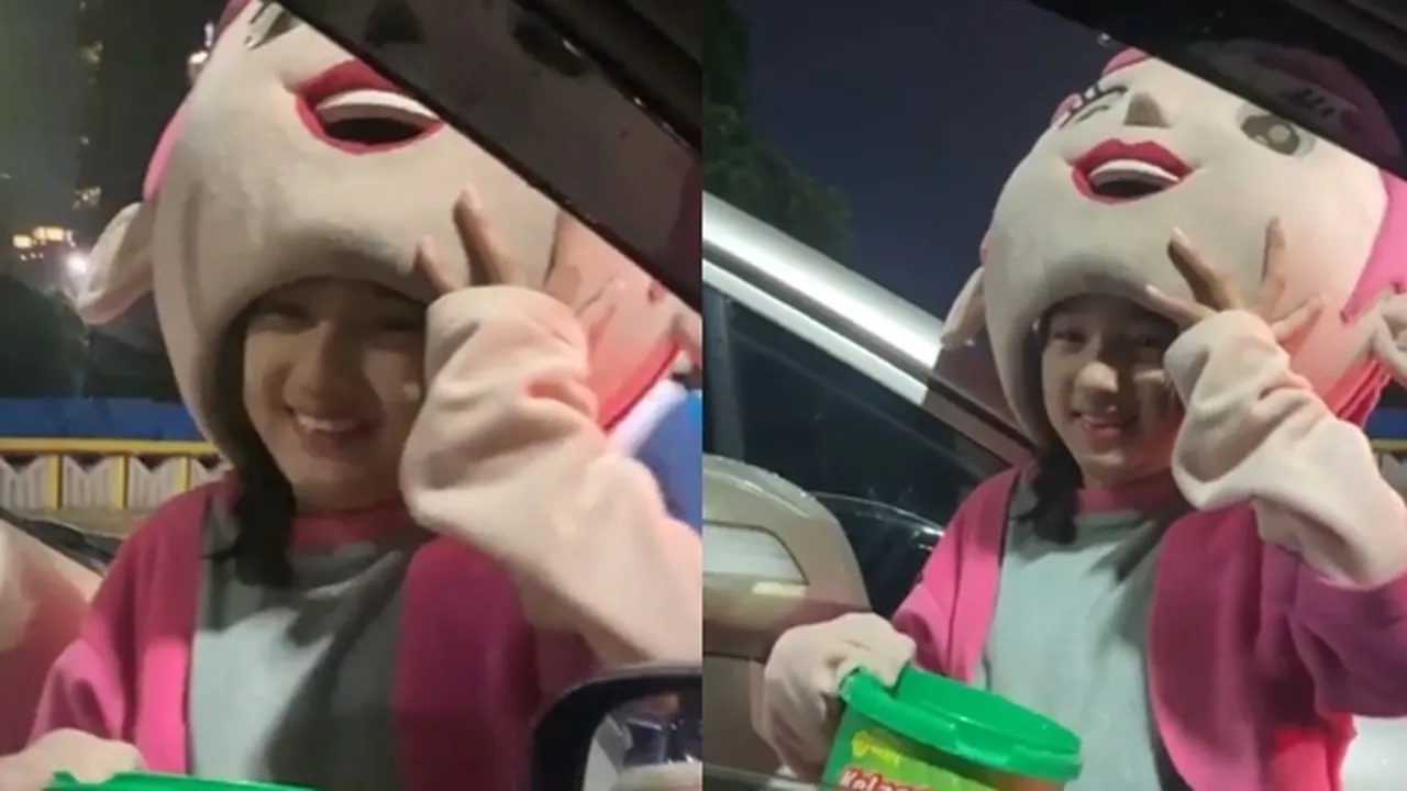 Sosok Gadis Pengamen Badut Cantik di Lampu Merah Bikin Heboh Netizen, Banyak yang Pengin Adopsi