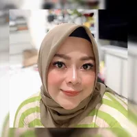 11 Potret Erni Citra Sari, Kakak Angkat Raffi Ahmad yang Jarang Terekspos
