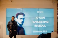 9 Potret Seru Afgansyah Reza di Fan Meeting in Seoul, Foto Bareng Fans Korea