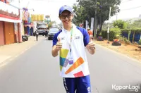 FOTO: Senyum Bangga Brandon Salim Ikut Bawa Obor Asian Games 2018