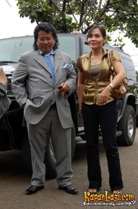 Hotman Paris Hutapea dan Ny Halimah