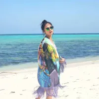 Liburan ke Makassar, Rini Yulianti Seksi Pakai Bikini di Pantai