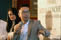 Foto Atiqah Hasiholan