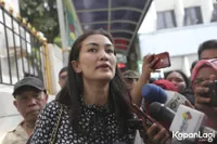 Foto Atiqah Hasiholan