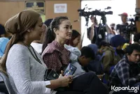 Foto Atiqah Hasiholan