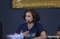 Foto Atiqah Hasiholan