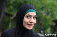 Foto Dhini Aminarti