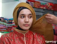 Foto Dhini Aminarti