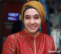 Foto Dhini Aminarti