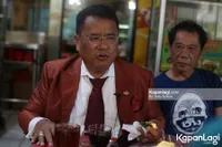 Foto Hotman Paris Hutapea