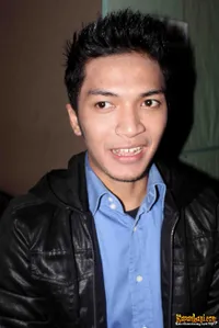 Foto Ihsan Tarore