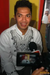 Foto Ihsan Tarore