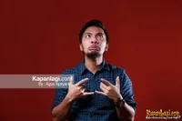 Foto Ihsan Tarore