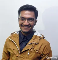 Foto Ihsan Tarore