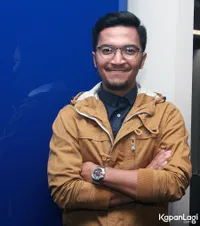 Foto Ihsan Tarore