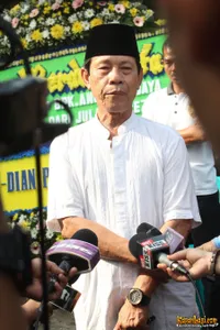 Foto Malih Tongtong