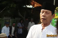 Foto Malih Tongtong