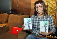 Foto Nova Riyanti Yusuf