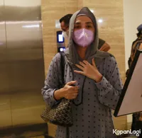 Foto Ussy Sulistiawaty