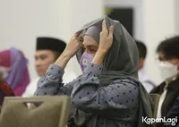 Foto Ussy Sulistiawaty