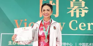 Potret Kris Dayanti Raih Medali Perak di Kejuaraan Dunia Wushu
