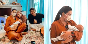 8 Potret Ashanty Gendong Baby L Anak Lesti, Si Kecil Gak Rewel dan Langsung Tidur Nemplok