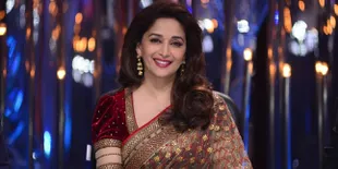Berpangku Tangan Cantik, Madhuri Dixit Siap Terbang ke Negara Ini
