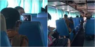 Cuek Bebek, Biksu Ini Tonton Video Porno Dalam Bus Tanpa Headset