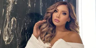 Foto Hot Pakai Plunging Dress, Netizen Malah Fokus ke Jakun Millen Cyrus