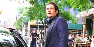 Hadiri Pesta, Orlando Bloom Cium Mesra Seorang Wanita