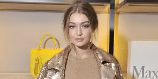 Mendadak Digendong Dari Belakang, Gigi Hadid 'Hajar' Pria Ini