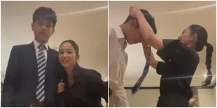 Momen Bunga Zainal Pakaikan Dasi ke Anaknya, Dukungan Penuh Sebelum Kompetisi Asian World MUN