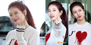 10 Foto Gemesin Suzy Menuju Paris, Rambut dan Rok Sama-Sama Merah