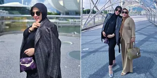 8 Foto Terbaru Bumil Glowing Syahrini di Singapura, Baby Bump Terlihat Makin Besar