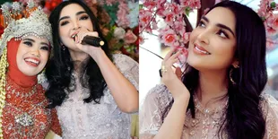8 Gaya Ashanty Saat Kondangan ke Pernikahan Karyawan, Cantik Kalem dengan Dress Bunga-Bunga