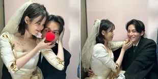 8 Potret IU dan V BTS di Photobooth Nikah MV 'Love Wins All', Fans Minta Bikin Versi Drama