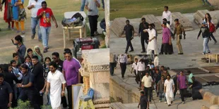 BTS Film 'RAEES', SRK Ditemani Gadis Cantik Jelita Bergaun Merah