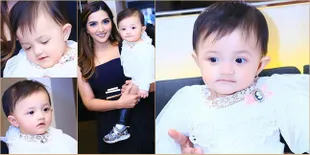 FOTO: Bayi Sosialita! Baby Arsy Pakai OOTD Mewah di Ultah Ashanty