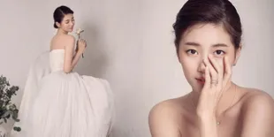 FOTO: Dibalut Dress Putih, Suzy Menjelma Jadi Pengantin Cantik