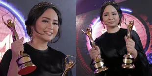 FOTO Jadi Penulis Lagu Anak, Gita Gutawa Raih Dua AMI Awards 2017